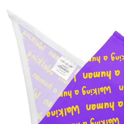purple "walking a human" repeating text bandana on a dog