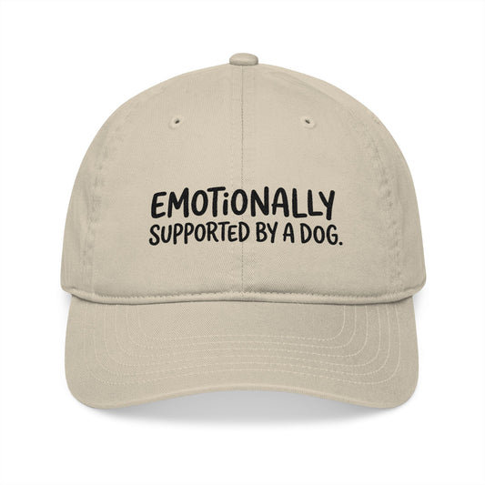 "Emotionally supported by a dog" embroidered organic cotton baseball cap