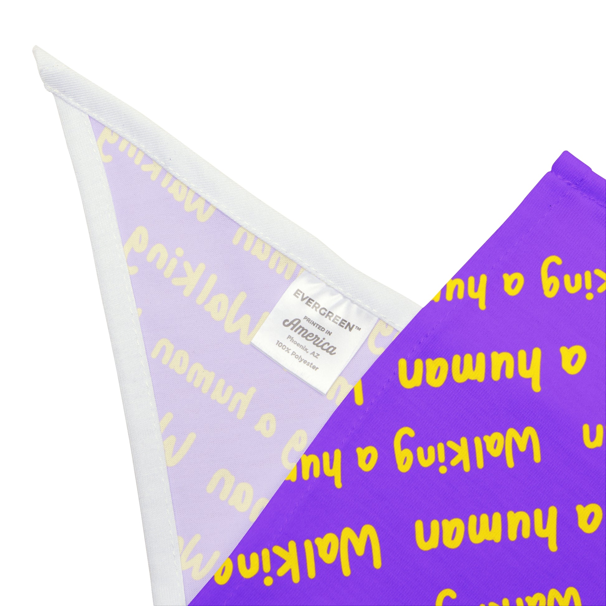purple "walking a human" repeating text bandana on a dog