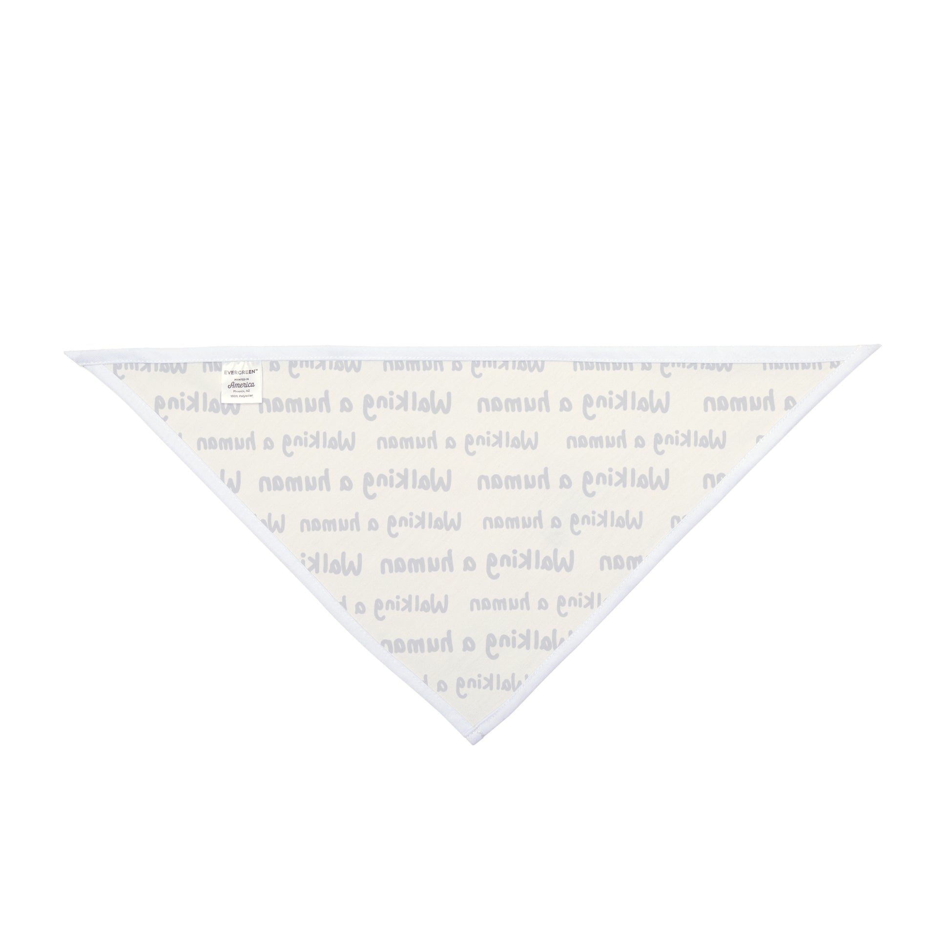 beige "walking a human" repeating text bandana on a small dog