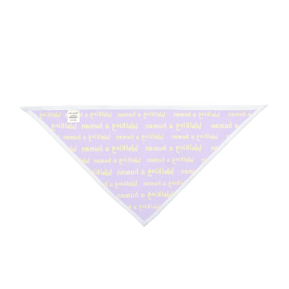 purple "walking a human" repeating text bandana on a dog