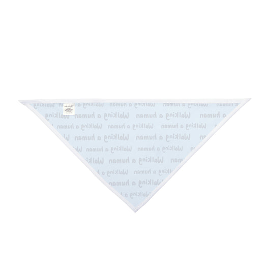 glacier blue "walking a human" repeating text bandana on a small dog