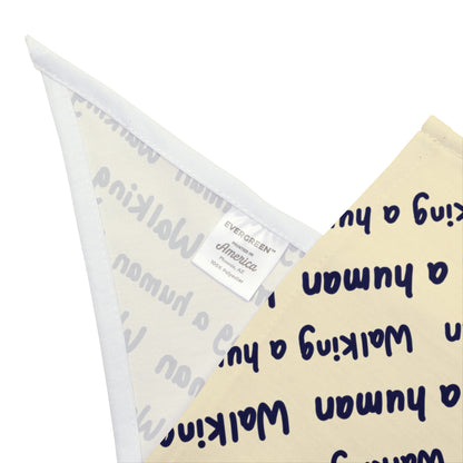 beige "walking a human" repeating text bandana on a small dog