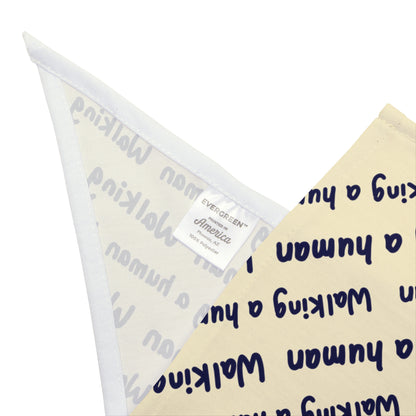 beige "walking a human" repeating text bandana on a small dog