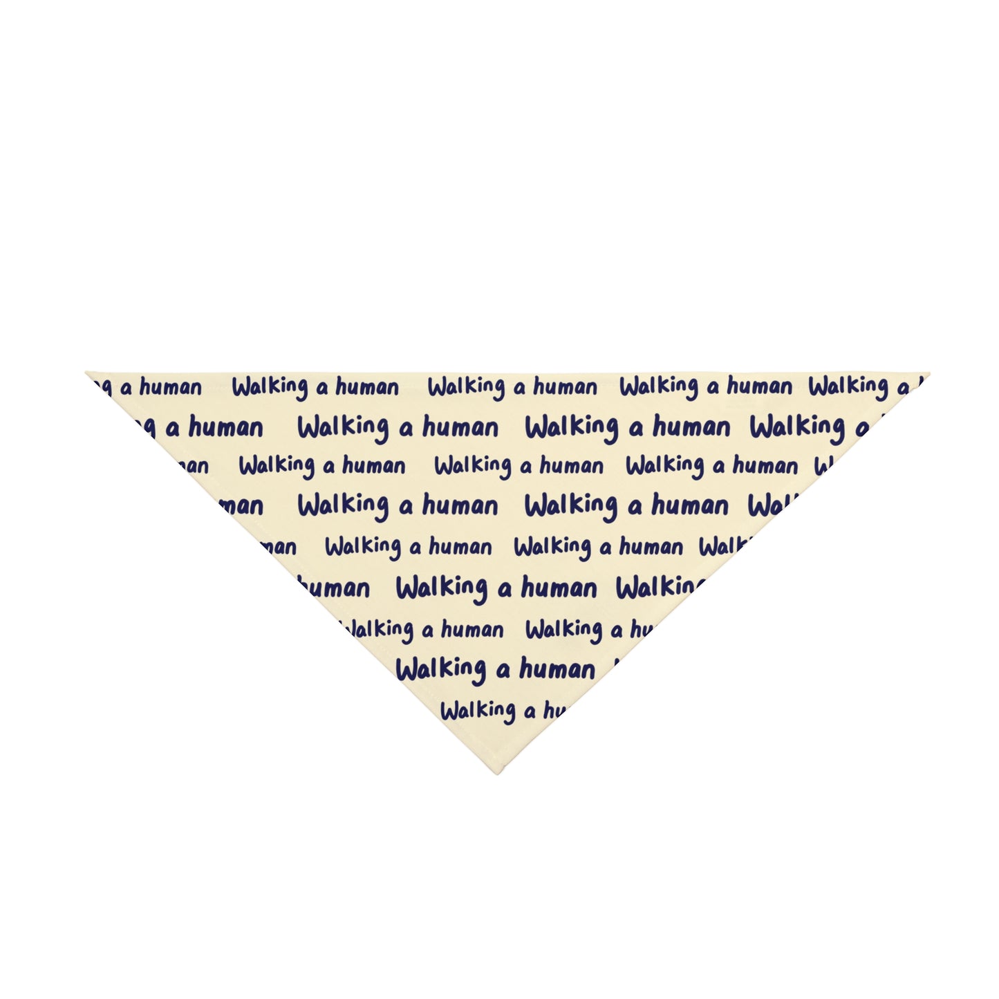 beige "walking a human" repeating text bandana on a small dog