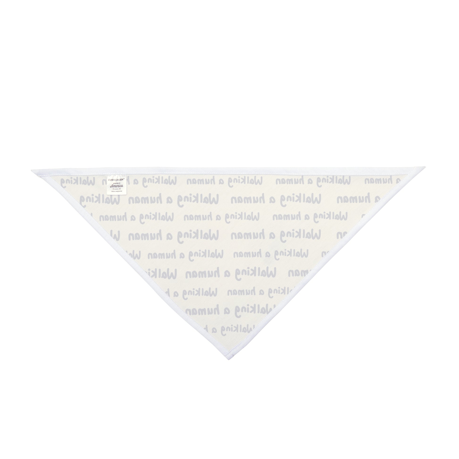 beige "walking a human" repeating text bandana on a small dog