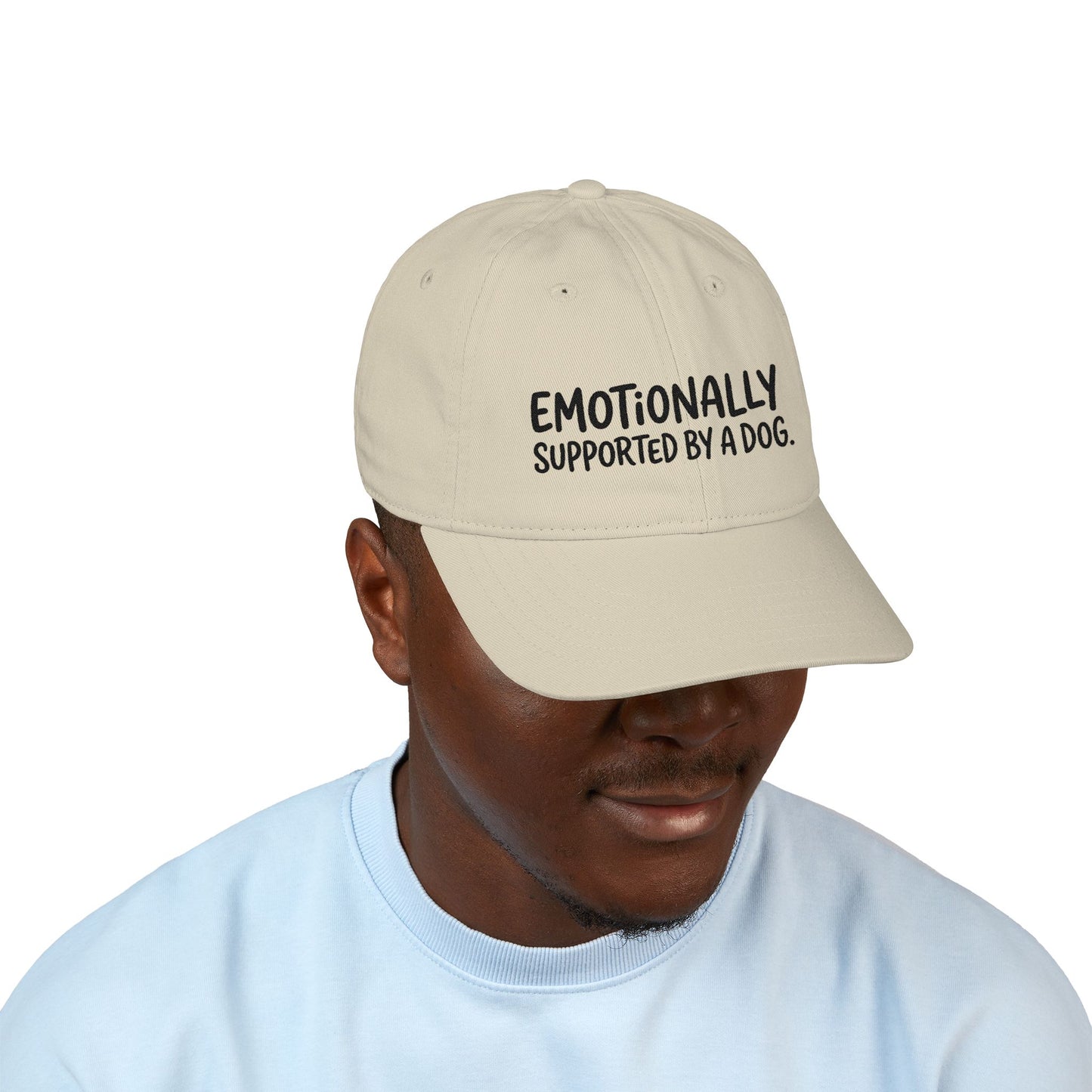 "Emotionally supported by a dog" embroidered organic cotton baseball cap