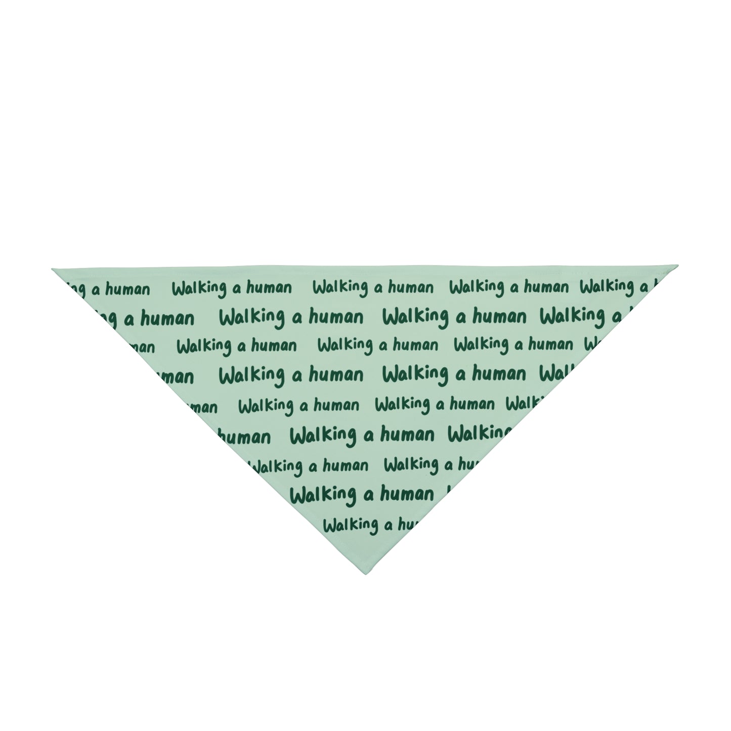 mint "walking a human" repeating text bandana on a dog