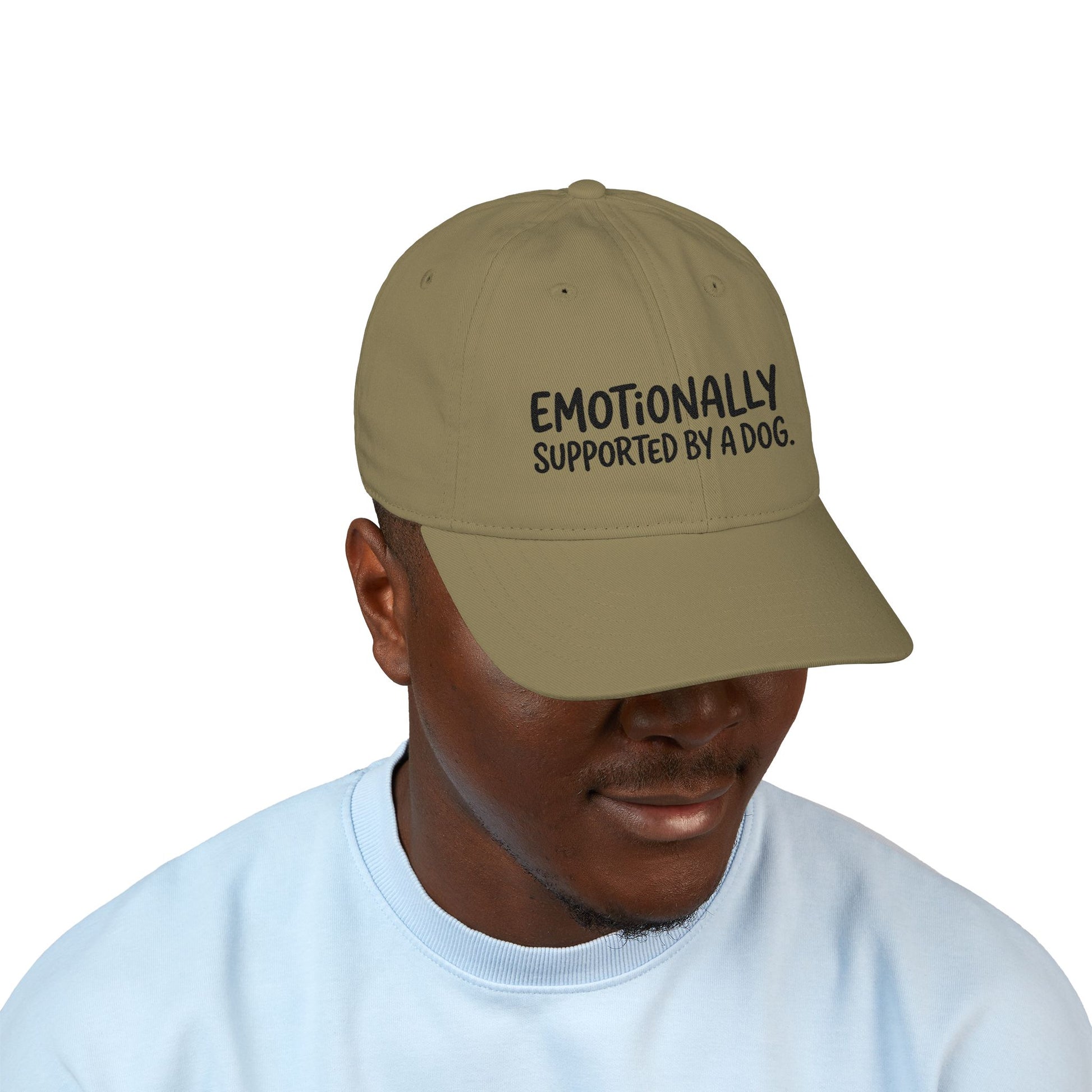 "Emotionally supported by a dog" embroidered organic cotton baseball cap