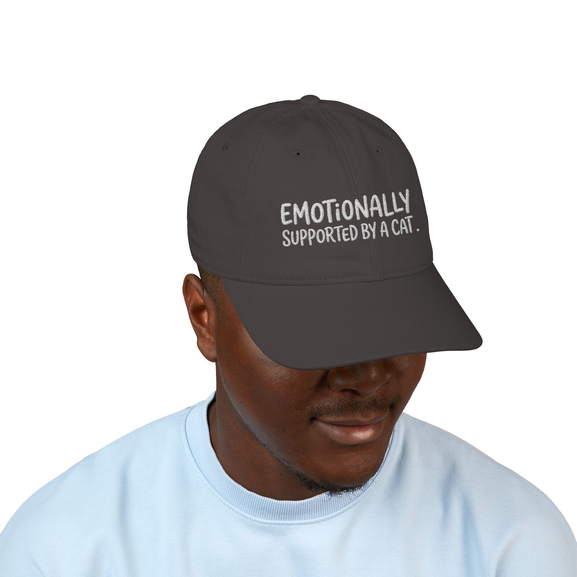 "Emotionally supported by a cat" embroidered organic cotton baseball cap