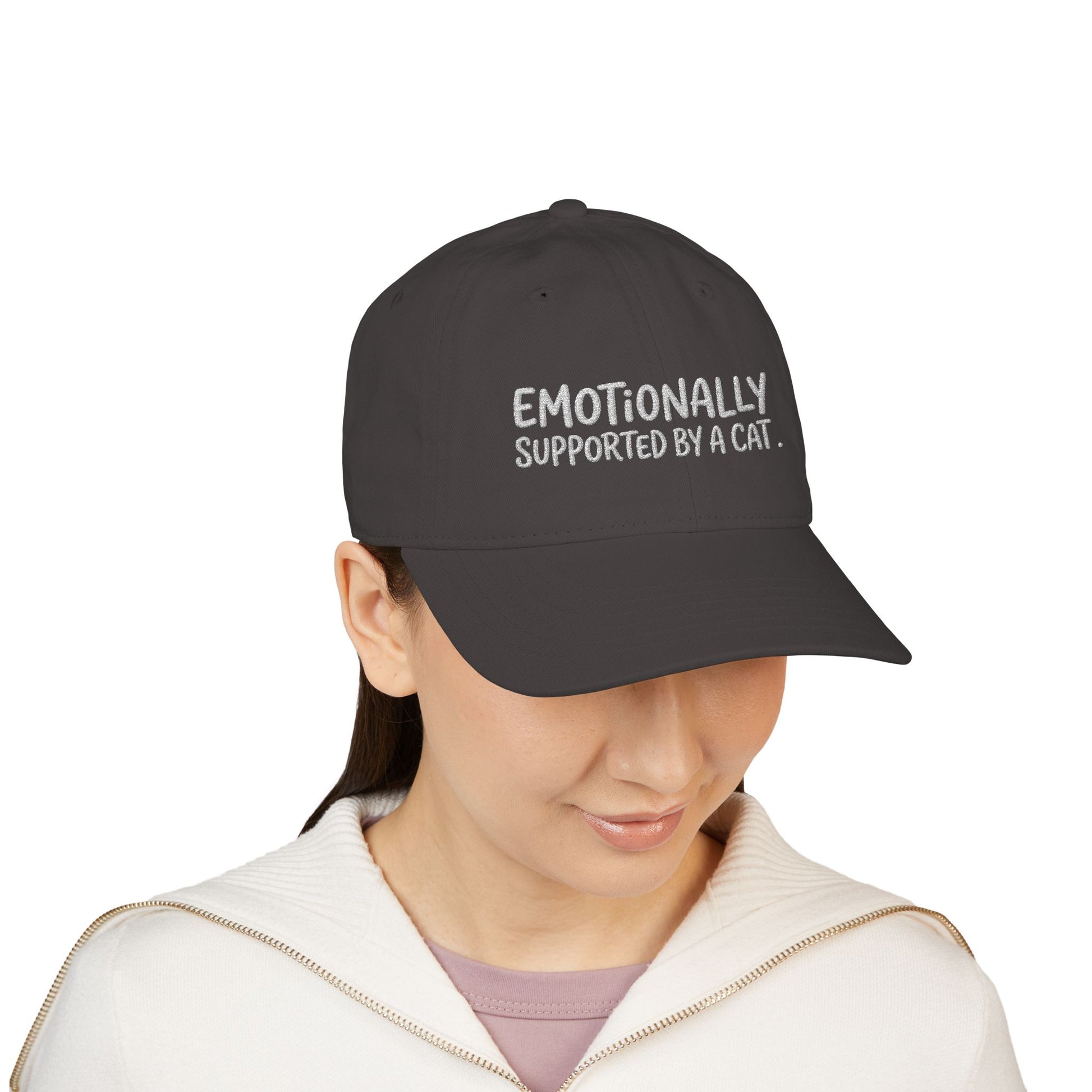 "Emotionally supported by a cat" embroidered organic cotton baseball cap