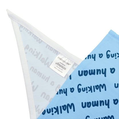 glacier blue "walking a human" repeating text bandana on a small dog