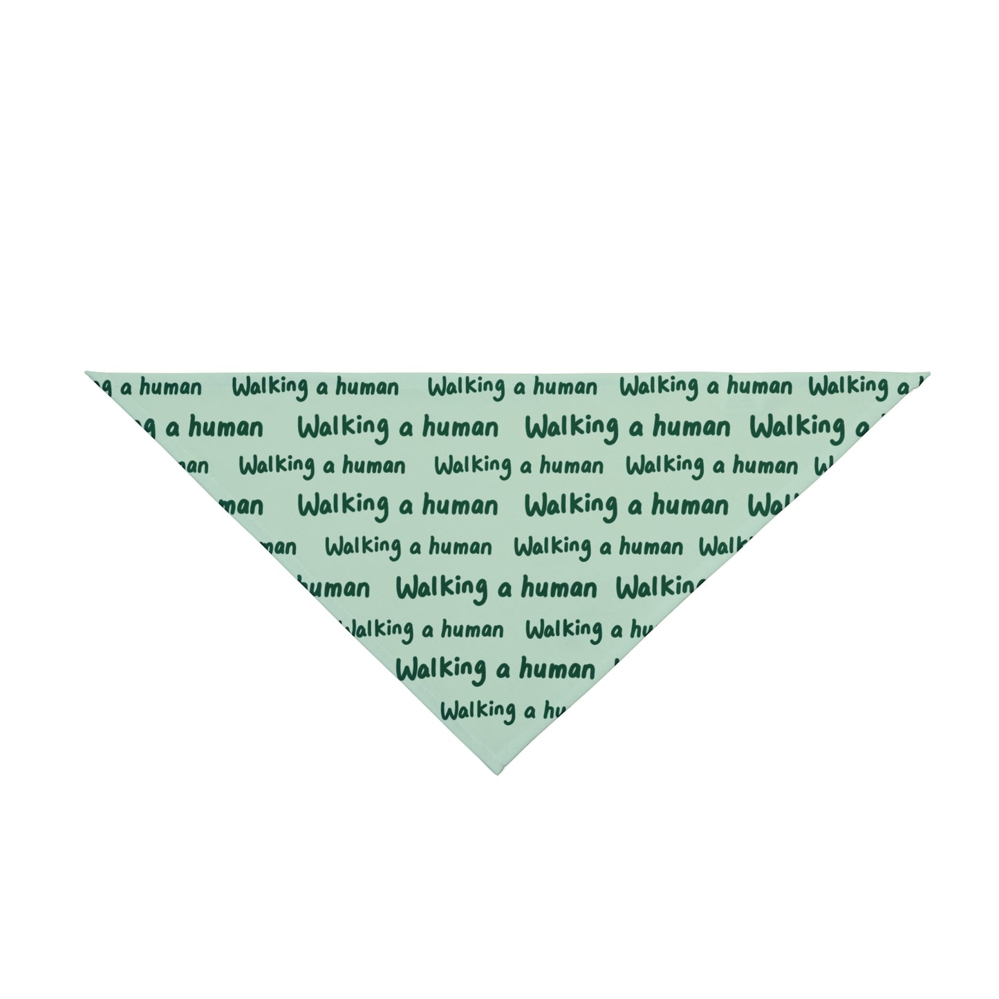 mint "walking a human" repeating text bandana on a dog