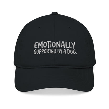 "Emotionally supported by a dog" embroidered organic cotton baseball cap