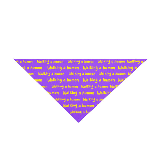 purple "walking a human" repeating text bandana on a dog
