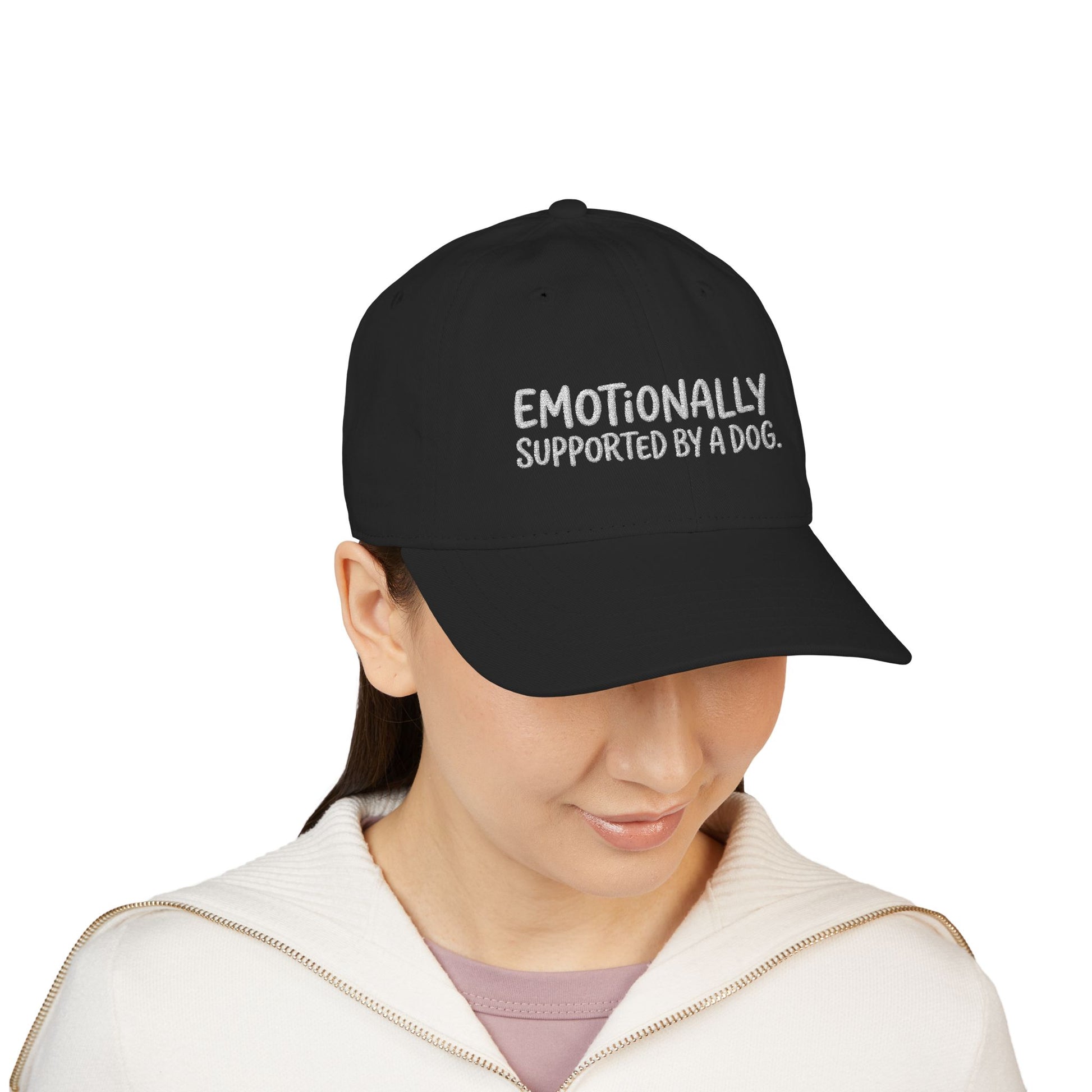 "Emotionally supported by a dog" embroidered organic cotton baseball cap